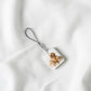 The Veloura Bond Tag